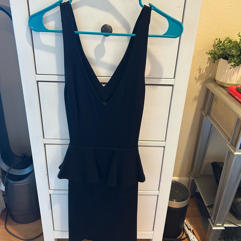 Solemio Black Backless Peplum Dress